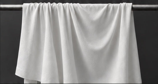 Illustrative white Legacy fabric hanging in soft folds