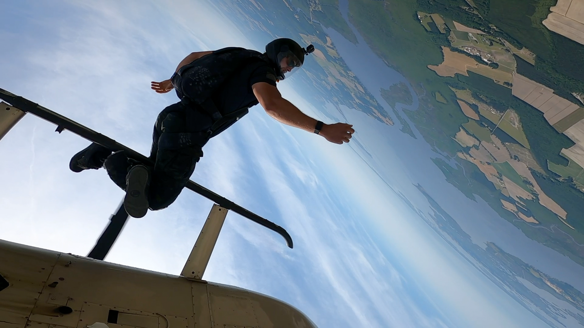 Nathaniel Mills during a helicopter jump